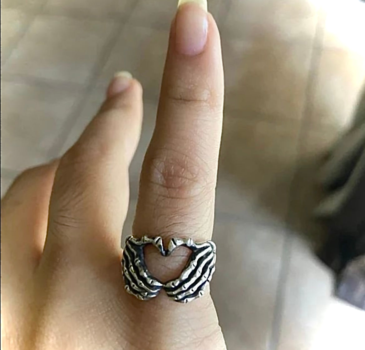 SKELETON HAND HEART RING