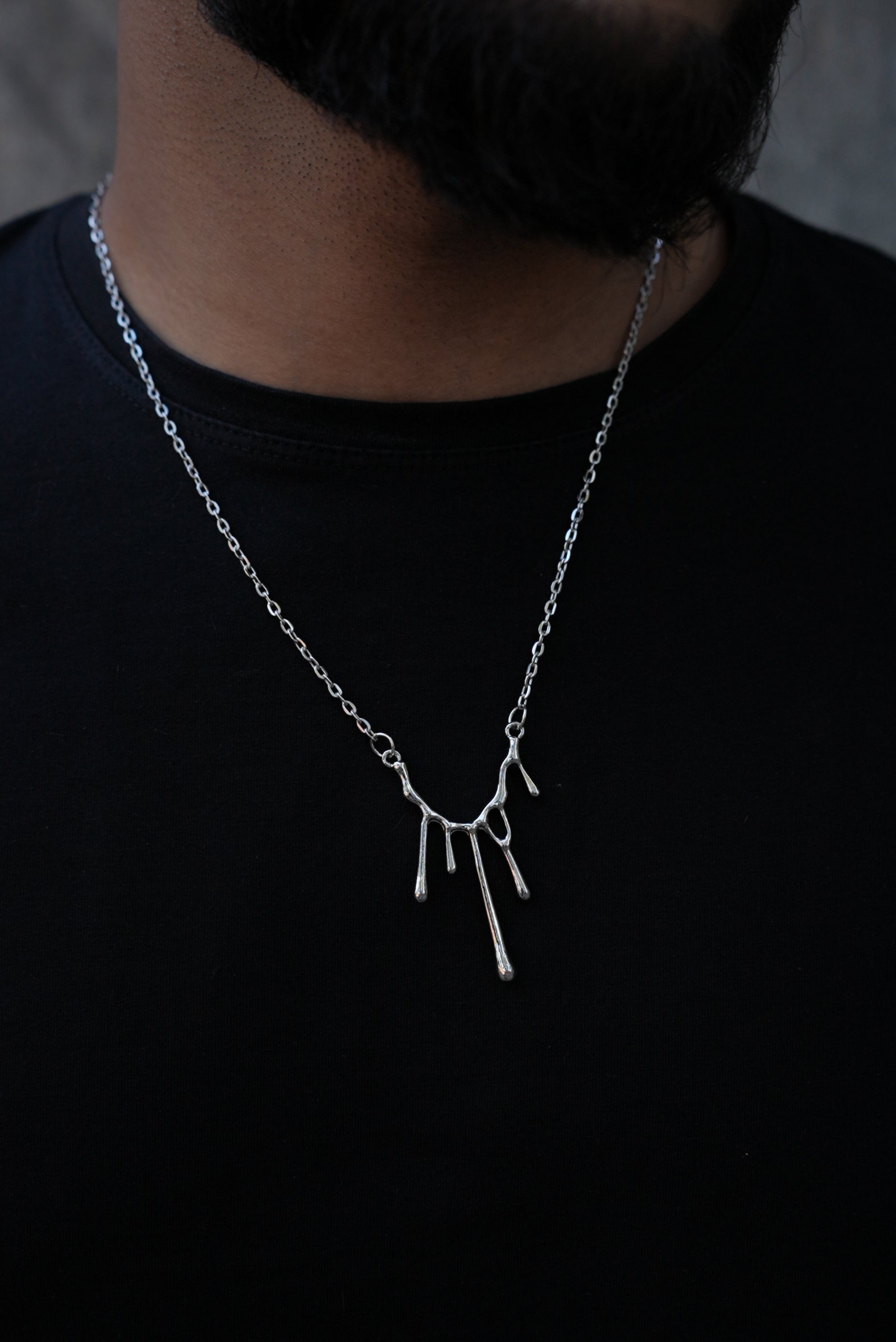 UNISEX MELTED CANDLE STAINLESS STEEL NECKLACE