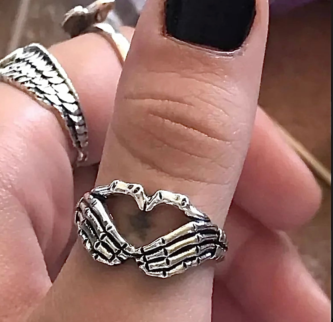 SKELETON HAND HEART RING